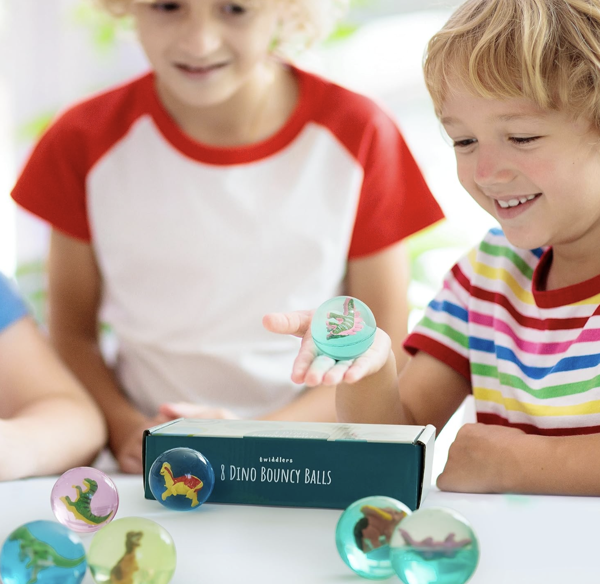 8 PALLINE IN GOMMA DINOSAURI - immagine 3
